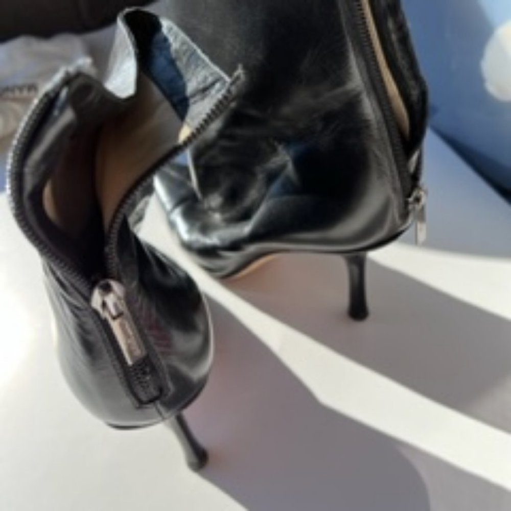 Black  all leaatherJimmy Chou boots with zippers in the back